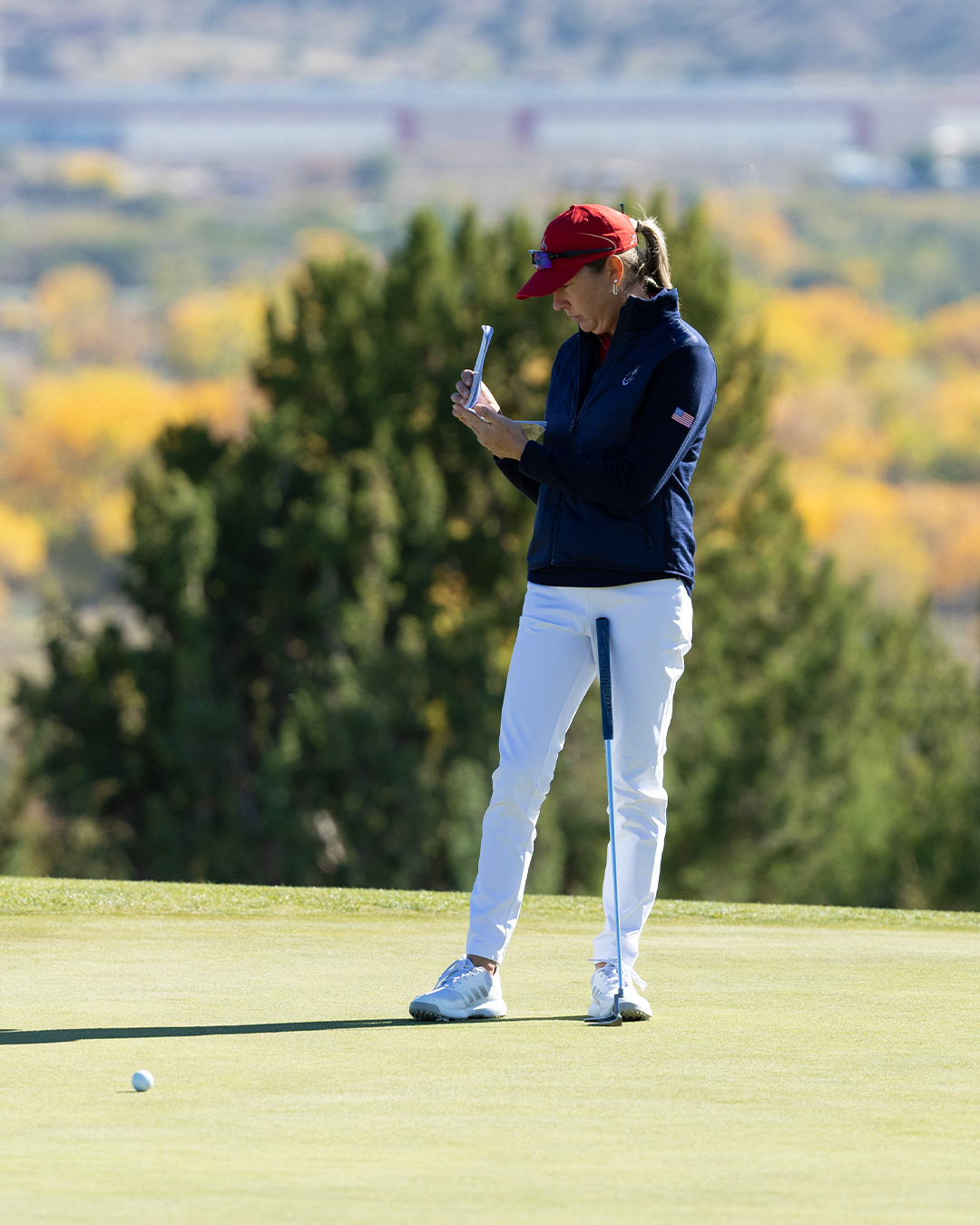 Ashley Grier of the U.S. Team checks her score book during the final round of the 2nd Women's PGA Cup at Twin Warriors Golf Club on Saturday, October 29, 2022 in Santa Ana Pueblo, New Mexico. (Photo by Sam Greenwood/PGA of America)
