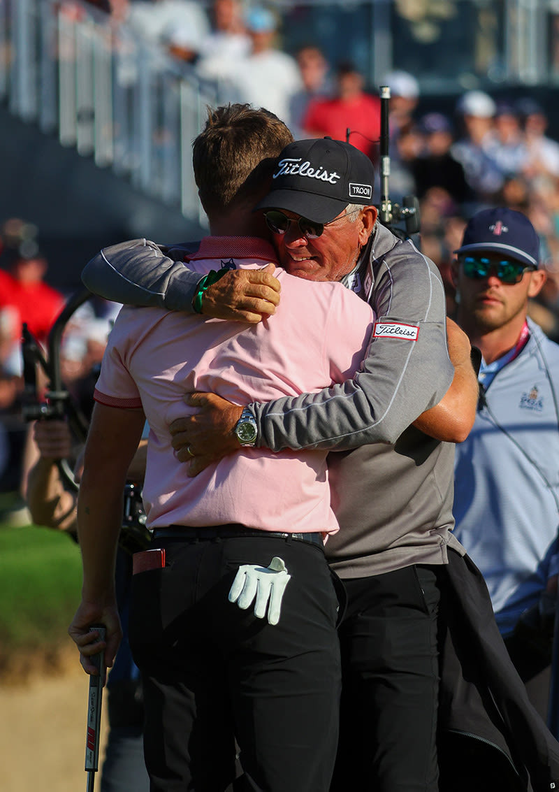 Justin Thomas embraces his father Mike Thomas, PGA following his win at the PGA Championship. (Photo by Andrew Redington/Getty Images)