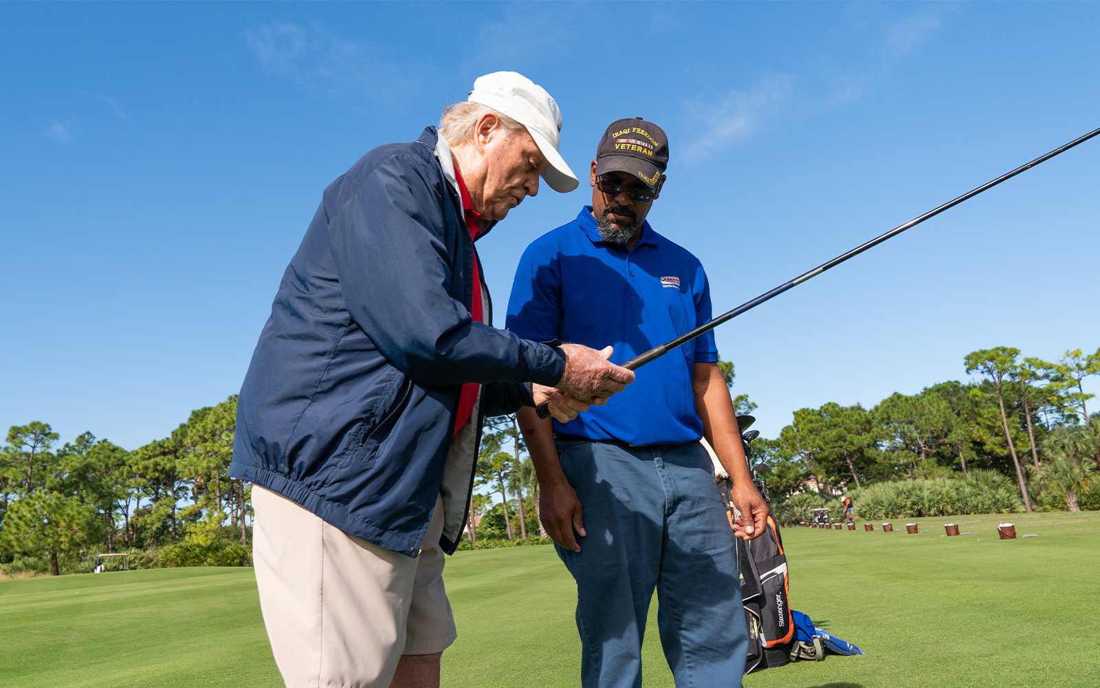 Jack Nicklaus assists a PGA HOPE Veteran during the Jack Nicklaus PGA HOPE Veterans Lessons at the Bear’s Club on November 29, 2021 in Jupiter, FL. (Photo by Hailey Garrett/PGA of America)