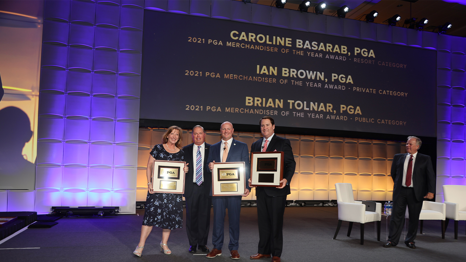 PGA of America President Jim Richerson poses for a photo with winners of the PGA Merchandiser of the Year Award, Resort Category - Caroline Basarab, Public Category - Brian Tolnar, and Private Category- Ian Brown during the PGA Special Awards night for the 106th PGA Annual Meeting at JW Marriott Phoenix Desert Ridge Resort & Spa on Tuesday, November 1, 2022 in Phoenix, Arizona. (Photo by Sam Greenwood/PGA of America)