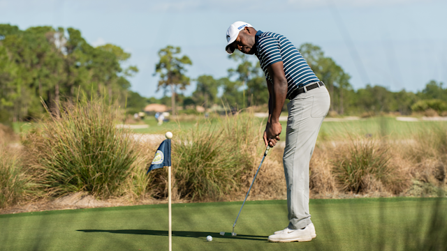 A contestant practices putting on the practice green during the final round of the APGA Tour held at the PGA Golf Club on February 21, 2021 in Port St. Lucie, Florida. (Photo by Hailey Garrett/PGA of America)