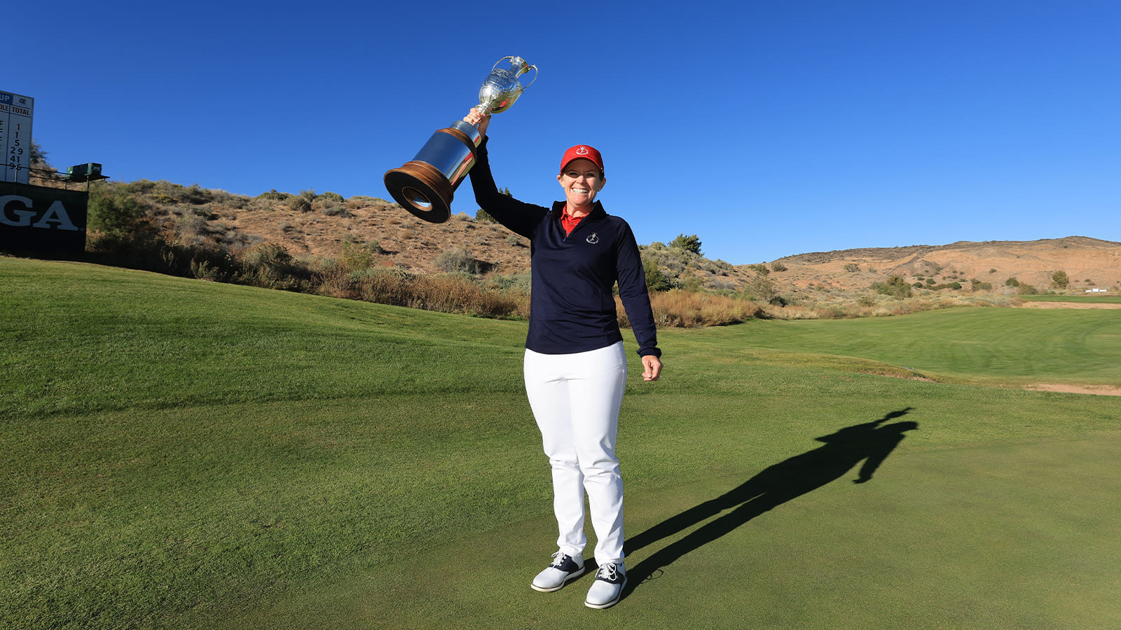 Stephanie Connelly-Eiswerth of the U.S. Team poses for a photo with the Women's PGA Cup during the final round of the 2nd Women's PGA Cup at Twin Warriors Golf Club on Saturday, October 29, 2022 in Santa Ana Pueblo, New Mexico. (Photo by Sam Greenwood/PGA of America)