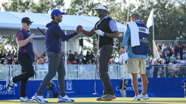 Vijay Singh of Fiji and his son Qass Singh celebrate after Vijay Singh had holed the winning putt on the 18th green during the final round of the 2022 PNC Championship at The Ritz-Carlton Golf Club on December 18, 2022 in Orlando, Florida. (Photo by David Cannon/Getty Images)