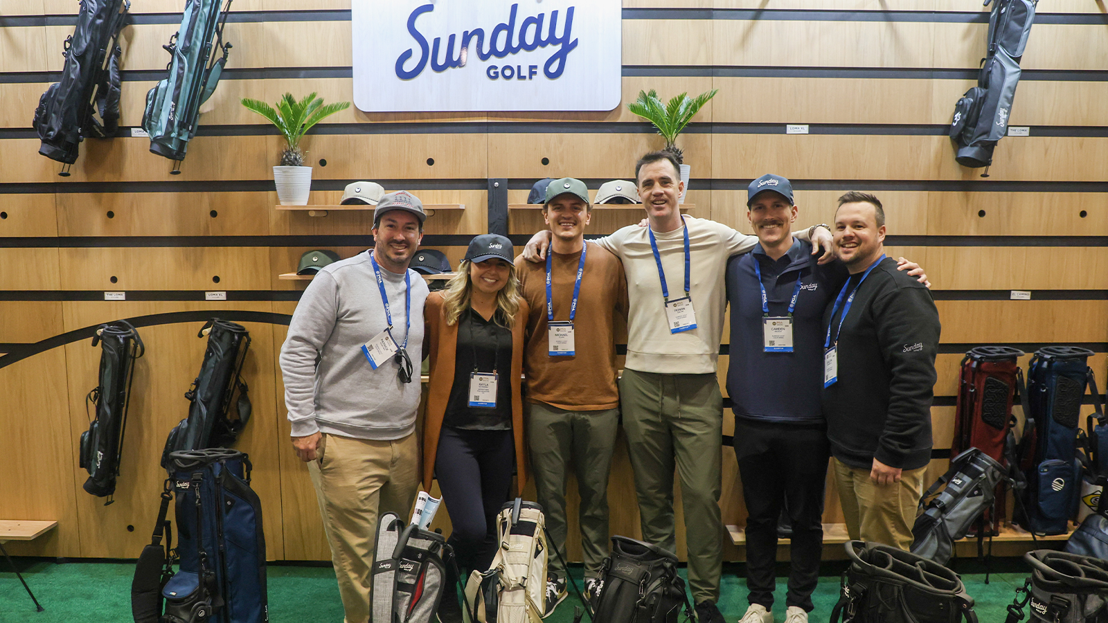 Kayla Gutierrez with Sunday Golf Co-Founder Ronan Galvin and other Sunday Golf staff. (Photo by Jon Seifarth)
