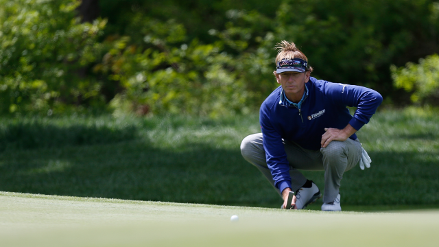 Brad Faxon lines up a putt at the KitchenAid Senior PGA Championship