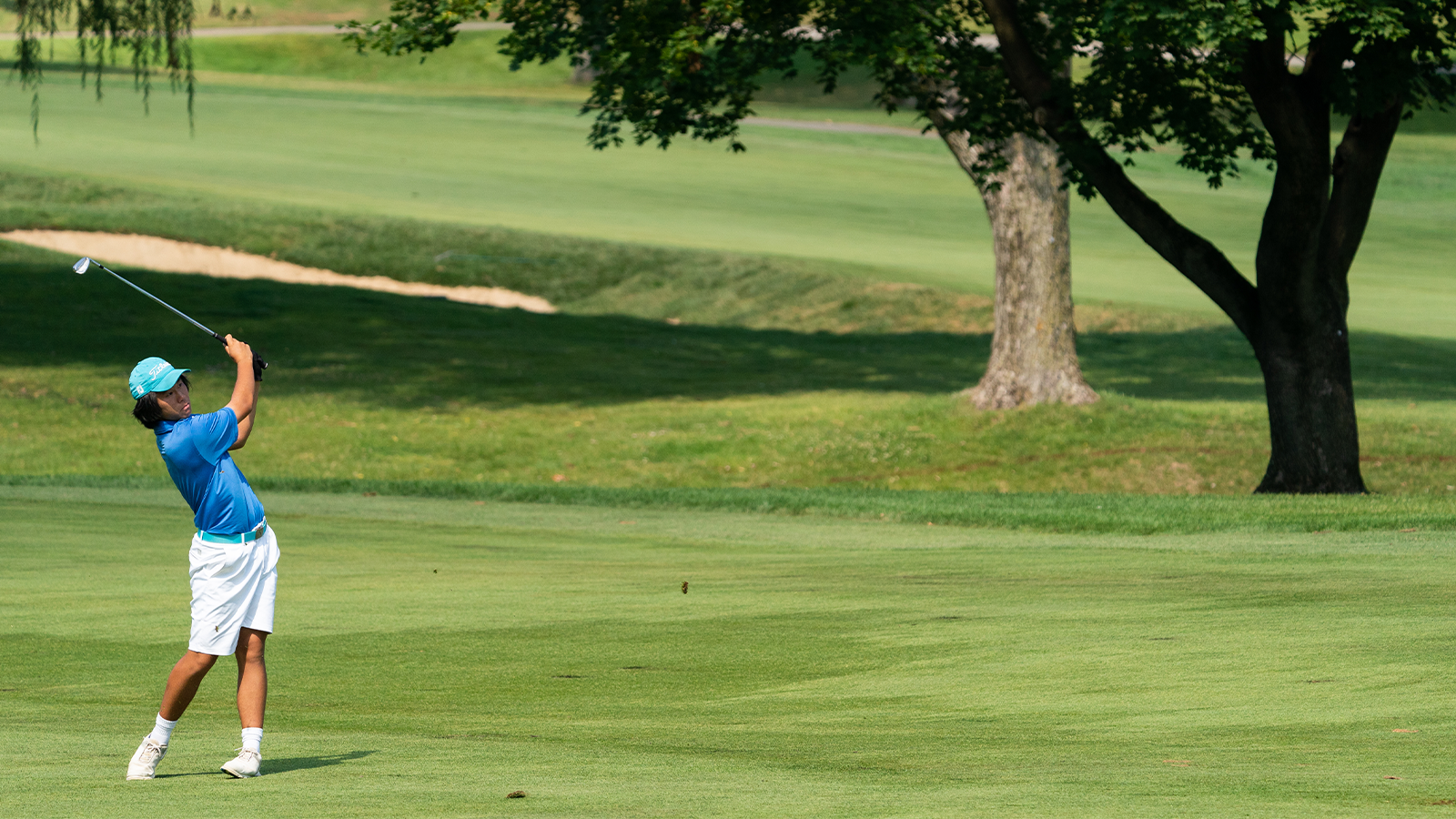 Ethan Gao hits his shot from the fairway on the third hole during the final round for the 46th Boys and Girls Junior PGA Championship held at Cog Hill Golf & Country Club on August 5, 2022 in Lemont, Illinois. (Photo by Hailey Garrett/PGA of America)