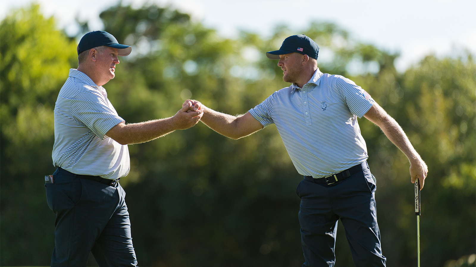 Bob Sowards of the United States and Ryan Vermeer of the United States shake hands on the 13th hole during the Afternoon Foursomes for the 29th PGA Cup held at the Omni Barton Creek Resort & Spa on September 27, 2019 in Austin, Texas. (Photo by Hailey Garrett/PGA of America)
