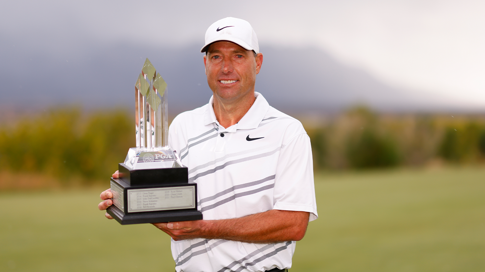 Matt Schalk poses for a portrait with the Senior PGA Professional Championship Trophy during the final round of the 34th Senior PGA Professional Championship at Twin Warriors Golf Club on October 16, 2022 in Santa Ana Pueblo, New Mexico. (Photo by Justin Edmonds/PGA of America)