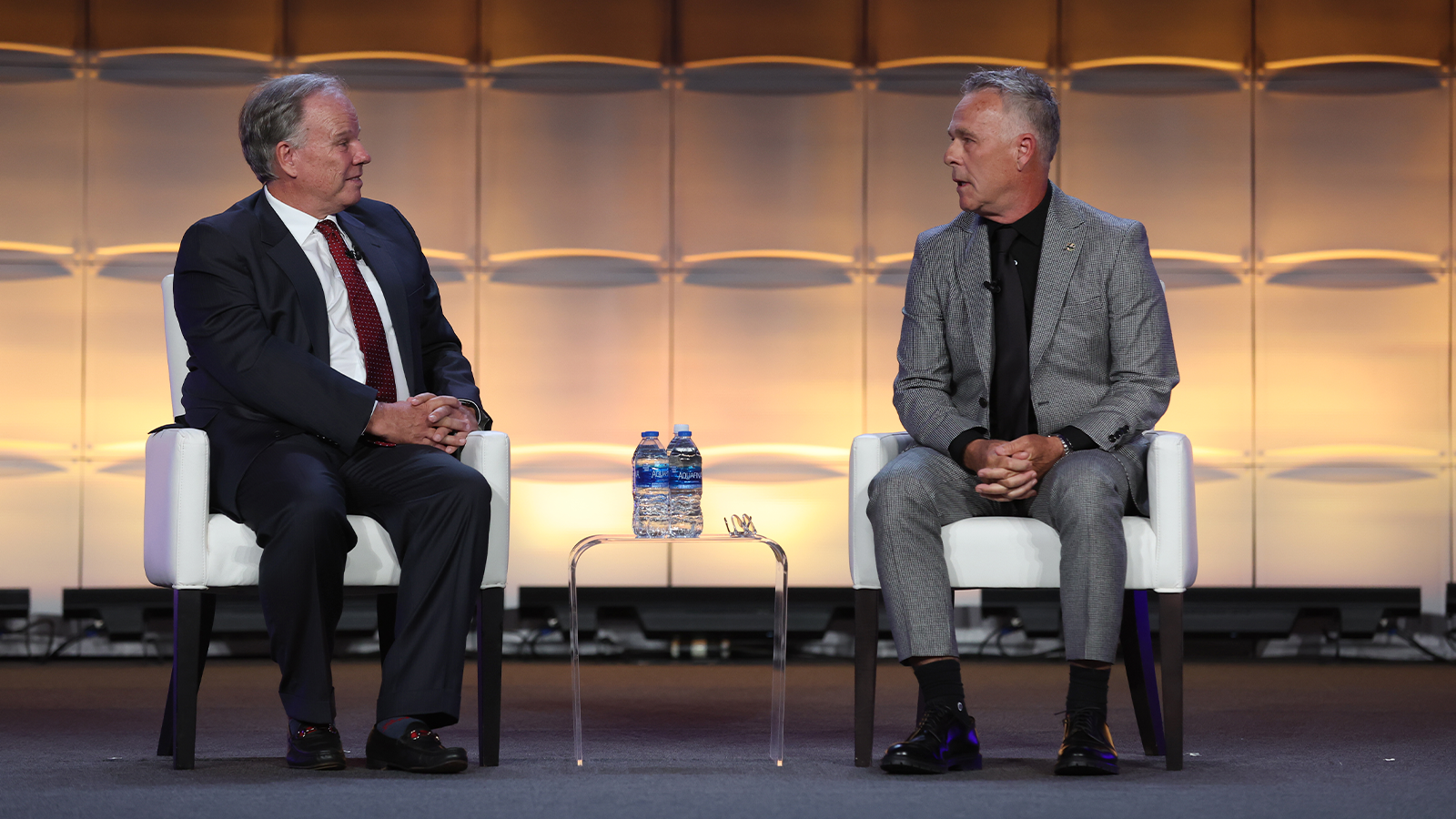 Master of Ceremonies, David Marr III talks with the winner of the PGA Teacher and Coach of the Year Award, Jamie Mulligan during the PGA Special Awards night for the 106th PGA Annual Meeting at JW Marriott Phoenix Desert Ridge Resort & Spa on Tuesday, November 1, 2022 in Phoenix, Arizona. (Photo by Sam Greenwood/PGA of America)