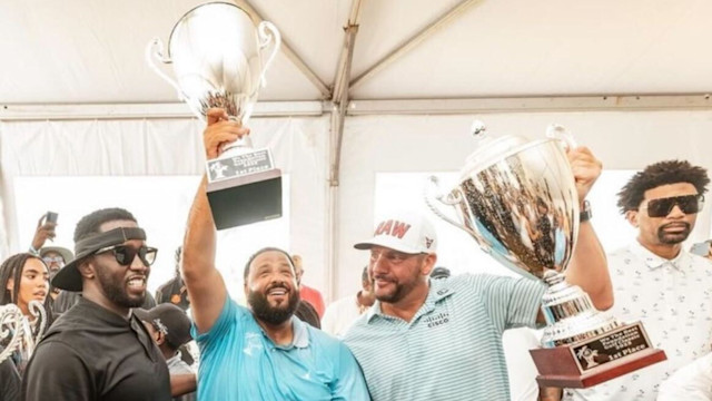 Michael Block, PGA, and DJ Khaled. (Getty Images)