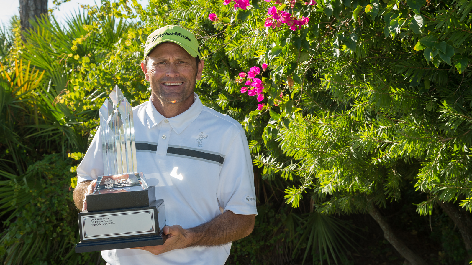 Champion Steve Schneiter poses with the Leo Fraser Trophy after the awards ceremony for the Senior PGA Professional Championship held at PGA Golf Club on November 20, 2016 in Port St. Lucie, Florida. (Photo by Montana Pritchard/PGA of America)