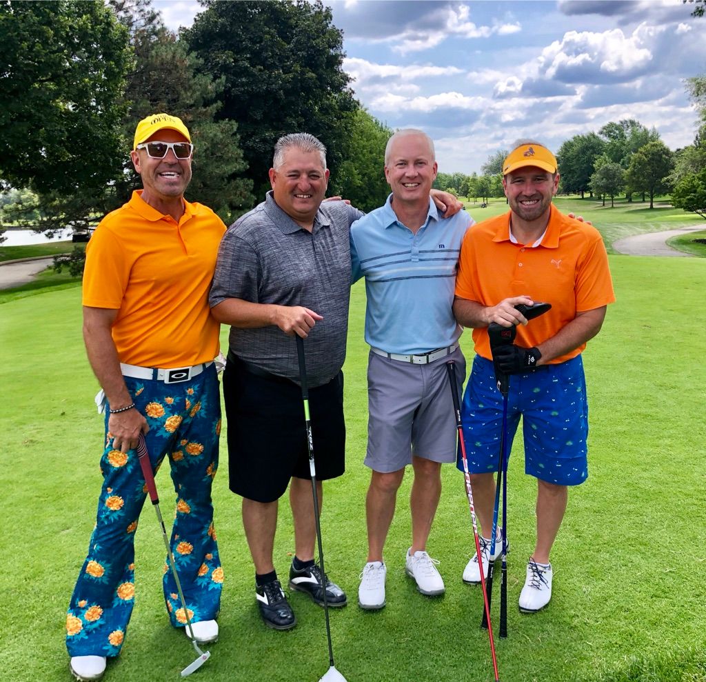 LaFrenere with friends on the course.