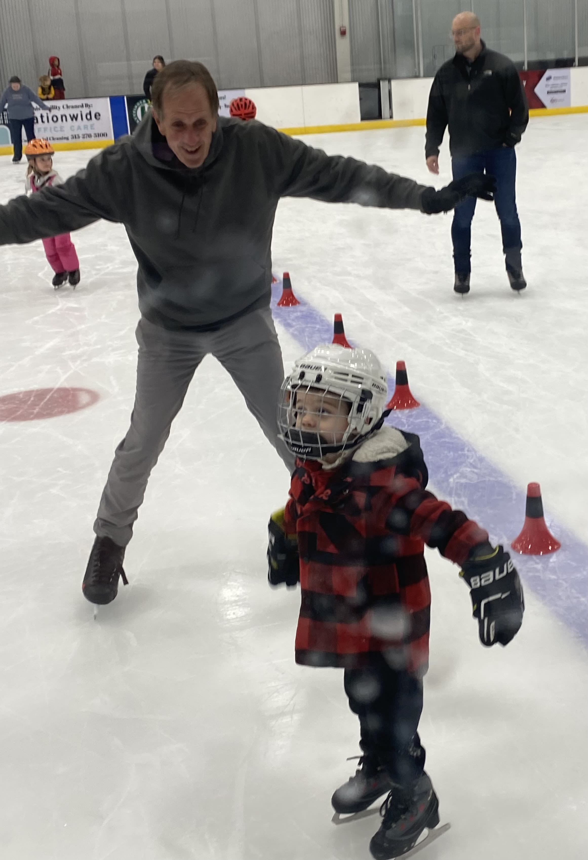 Even through health challenges, Egly finds little moments of joy, like skating with his grandson.