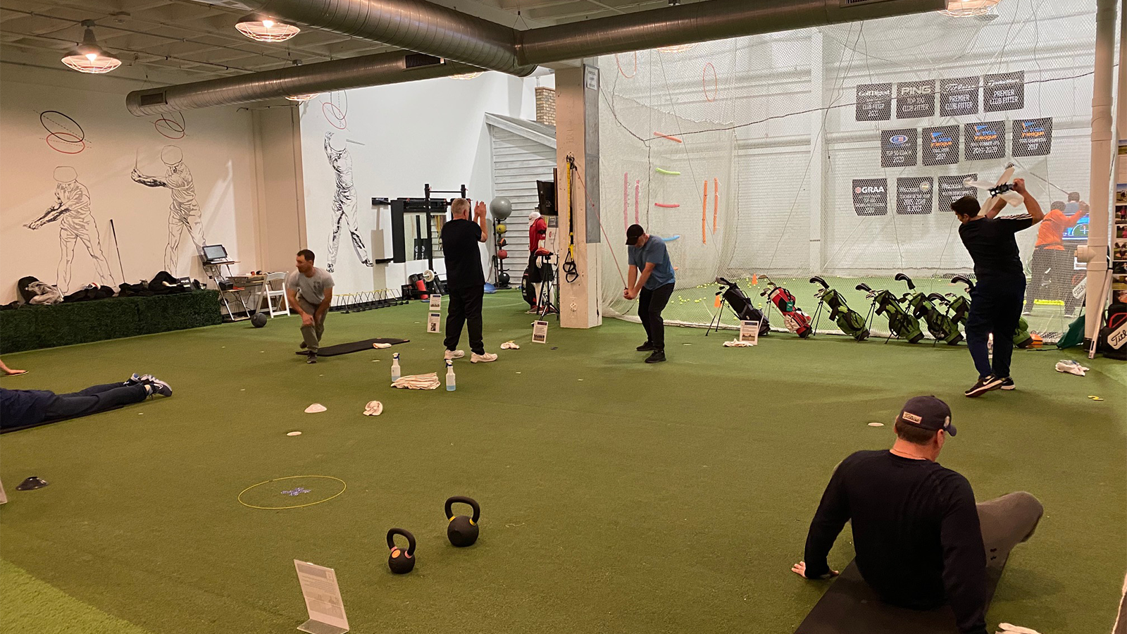 PGA Coach Mike Tabbert's students train at Ironworks Golf Academy. 