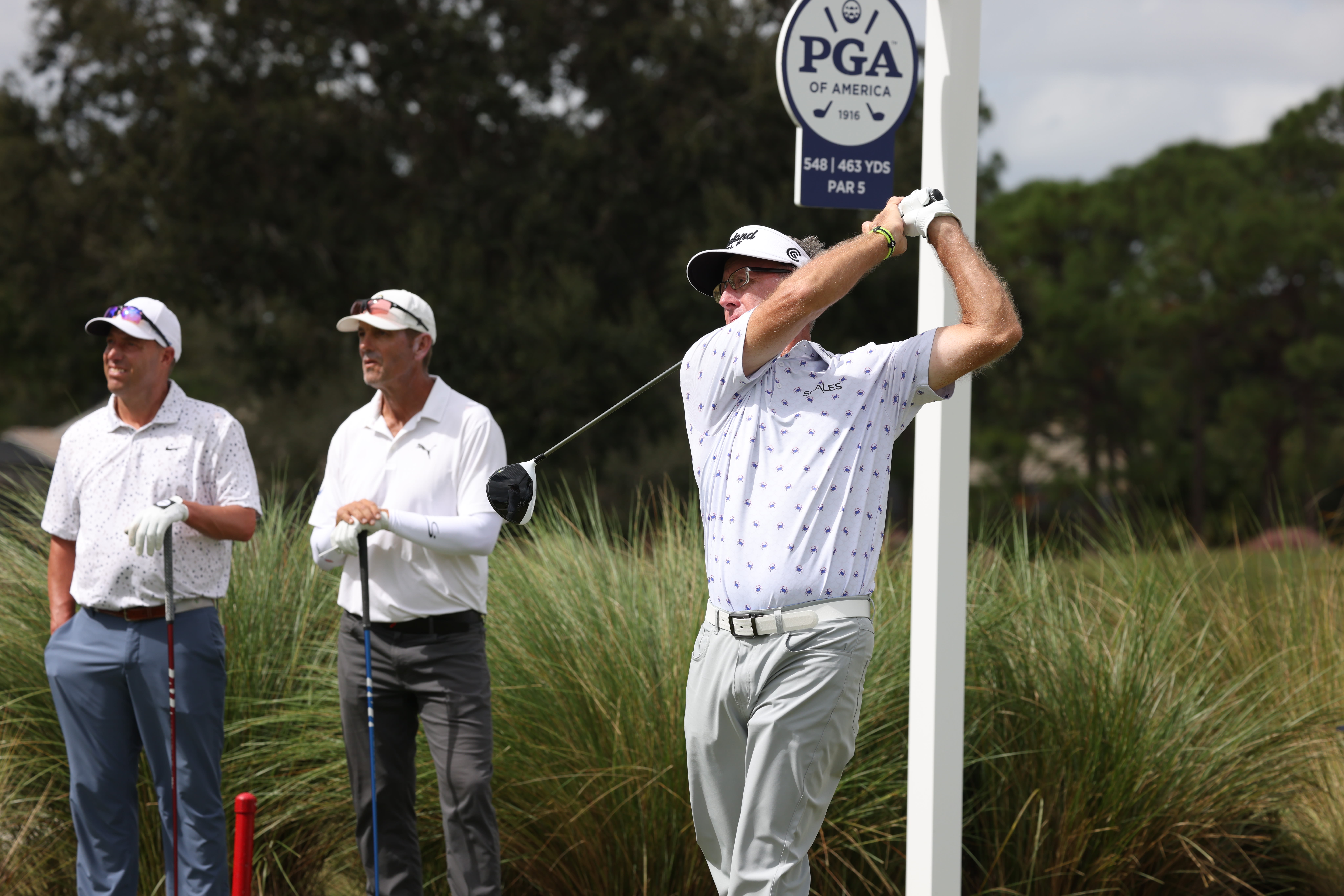 Alan Morin hits his tee shot.
