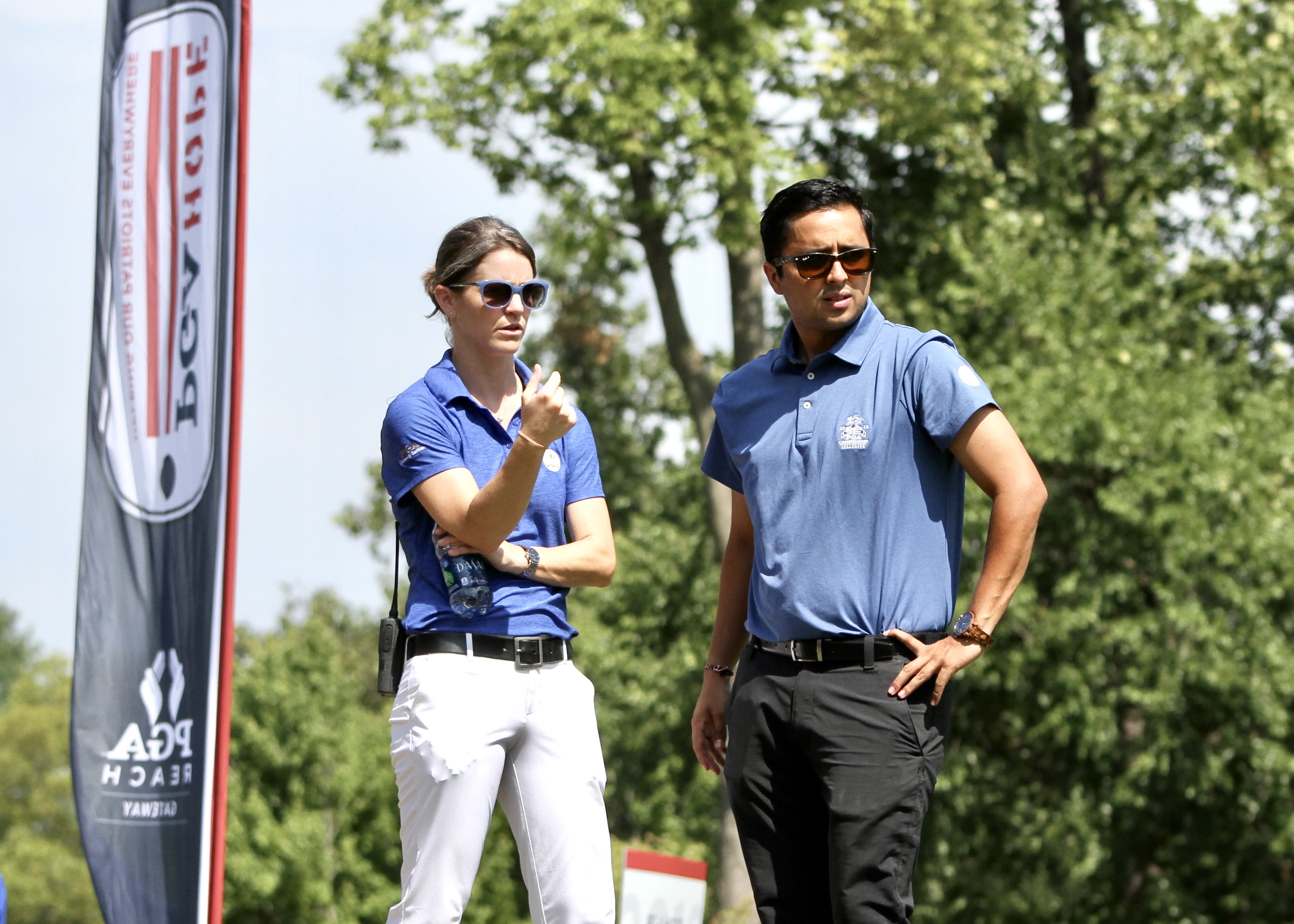 Ali Wells (left) has found a passion in helping develop the golf careers of others.