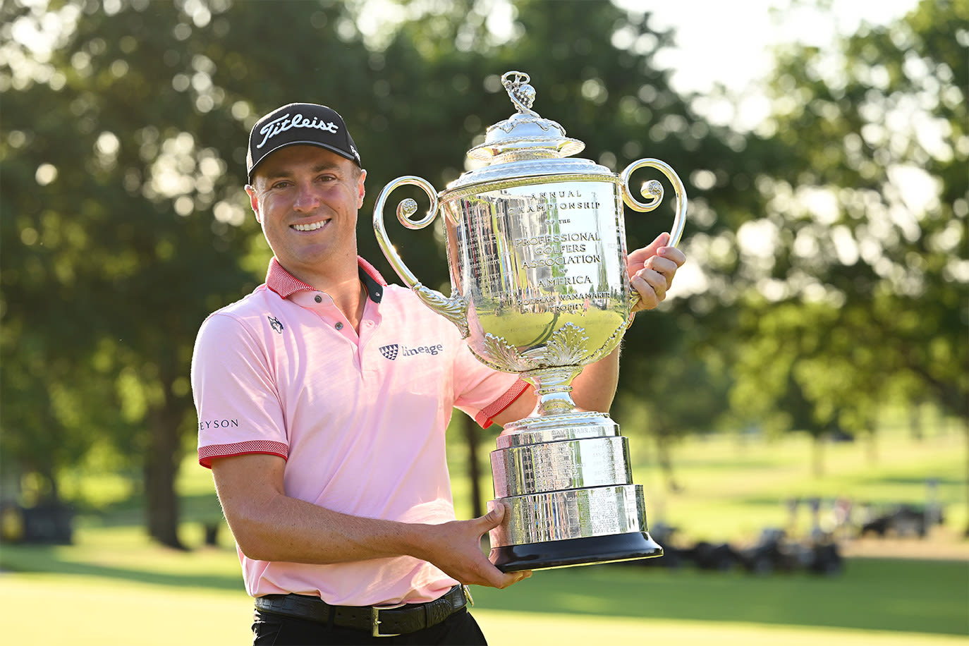 Justin Thomas poses with the Wanamaker Trophy (Photo by Andrew Redington/Getty Images)