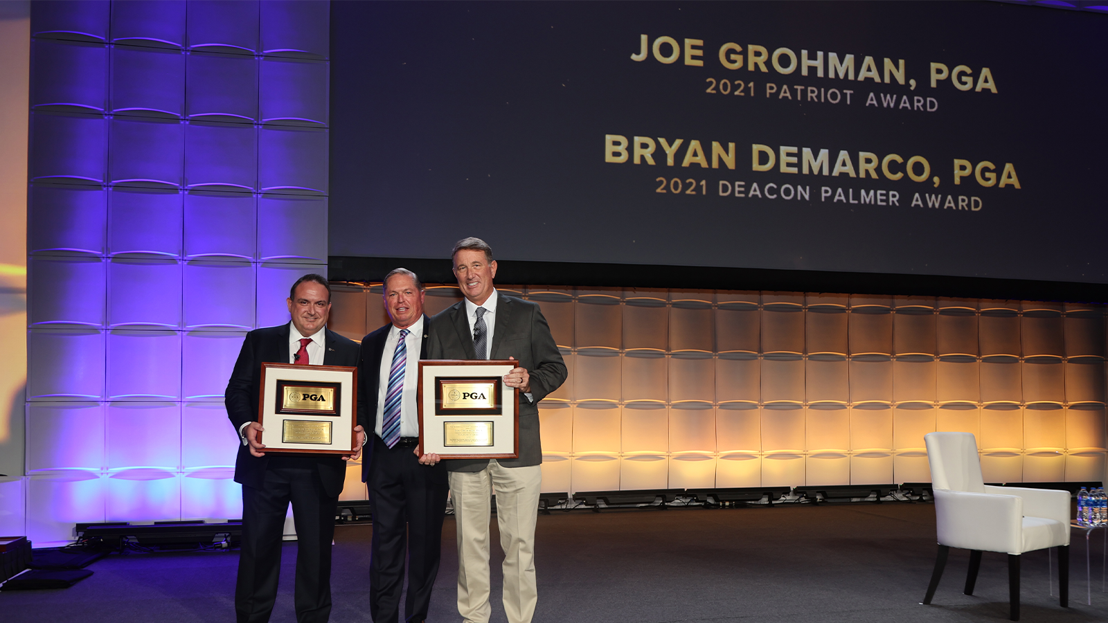 PGA of America President Jim Richerson poses for a photo with the winner of the Deacon Palmer Award Bryan Demarco and winner of the Patriot Award Joe Grohman during the PGA Special Awards night for the 106th PGA Annual Meeting at JW Marriott Phoenix Desert Ridge Resort & Spa on Tuesday, November 1, 2022 in Phoenix, Arizona. (Photo by Sam Greenwood/PGA of America)