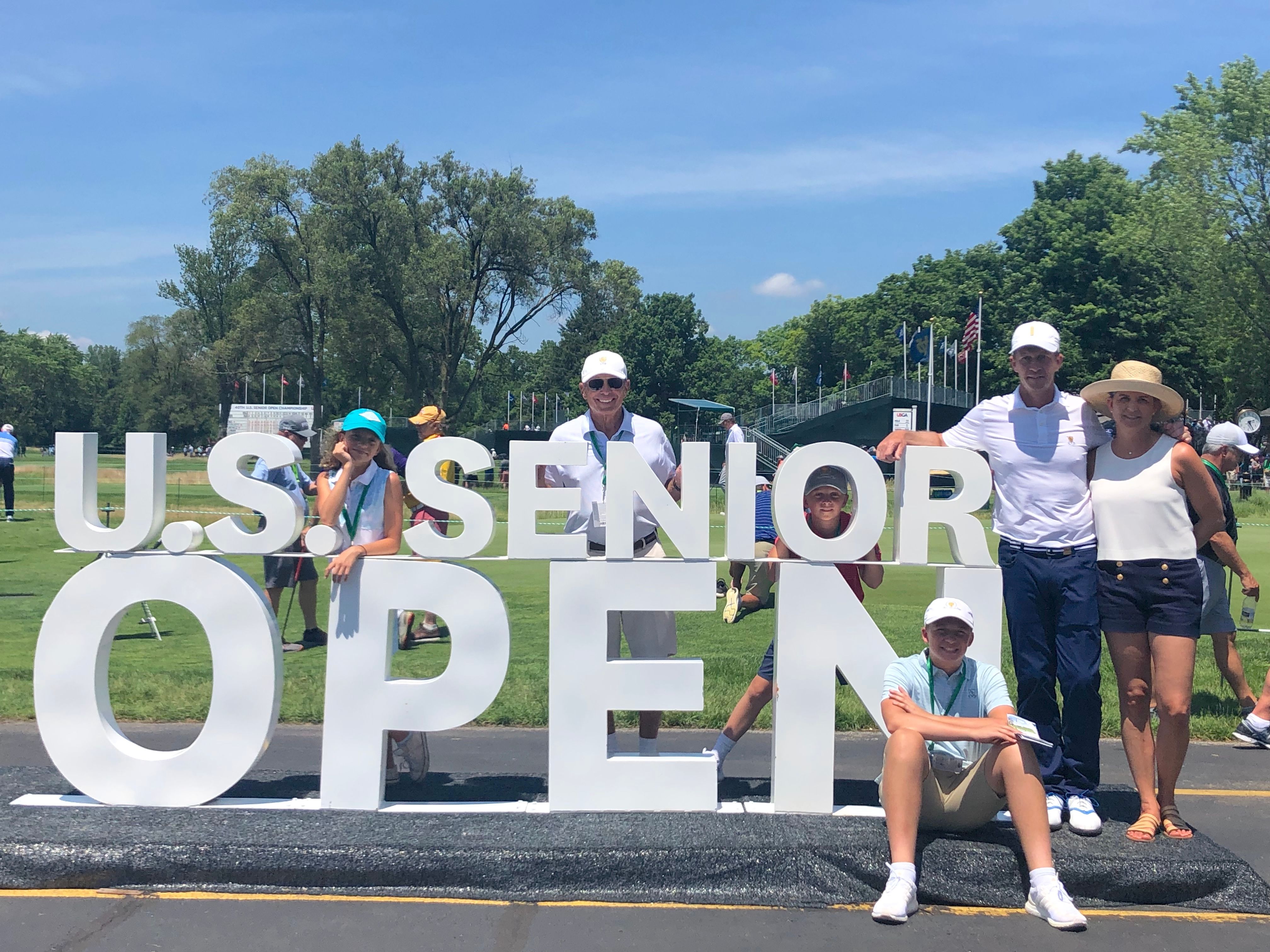 Paris with his family at the U.S. Senior Open