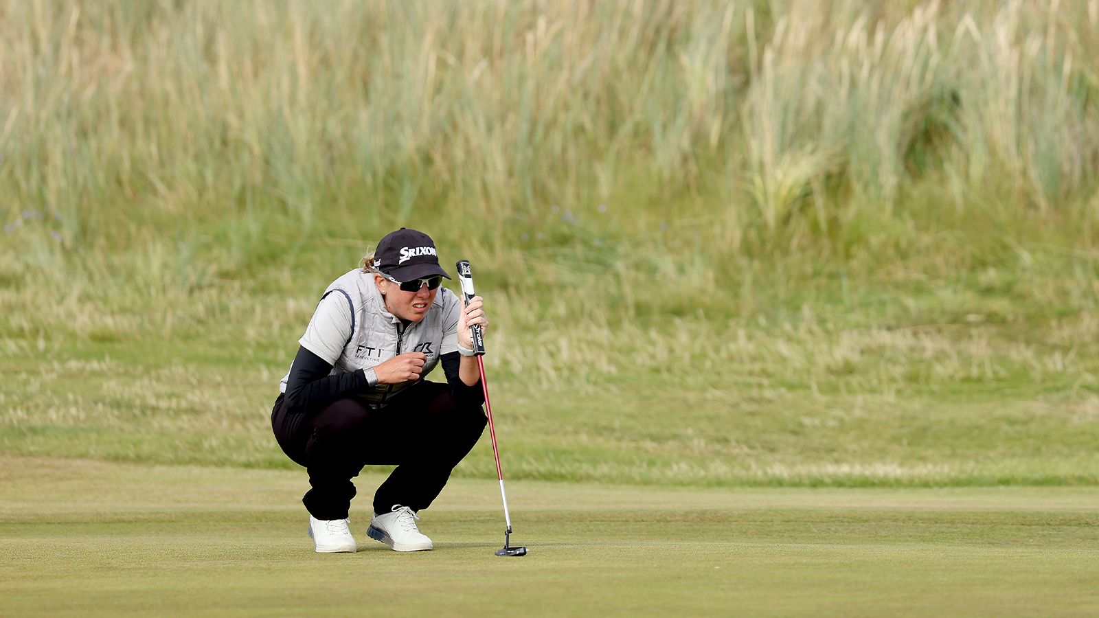 Ashleigh Buhai of South Africa plays her putt shot from the 10th hole during Day Three of the AIG Women's Open at Muirfield on August 06, 2022 in Gullane, Scotland. (Photo by Charlie Crowhurst/Getty Images)