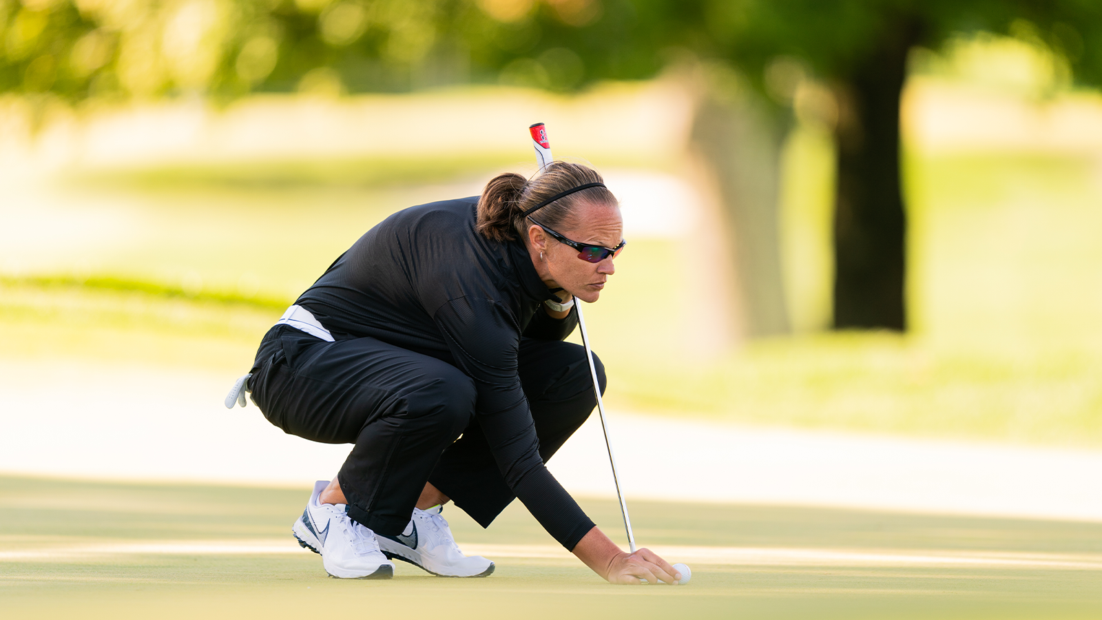 PGA Professional Jennifer Borocz reads her putt on the sixth hole during the first round of the 2020 KPMG Women's PGA Championship at Aronimink Golf Club.