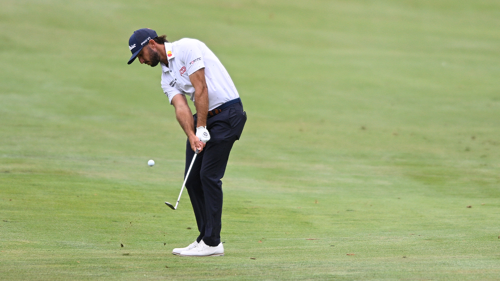 Max Homa of the United States hits his second shot on the 12th hole during the third round of the Fortinet Championship at Silverado Resort and Spa North course on September 17, 2022 in Napa, California. (Photo by Orlando Ramirez/Getty Images)