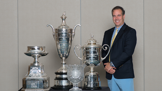 PGA Master Professional Brian Crowell, PGA, with the PGA Championships trophies.