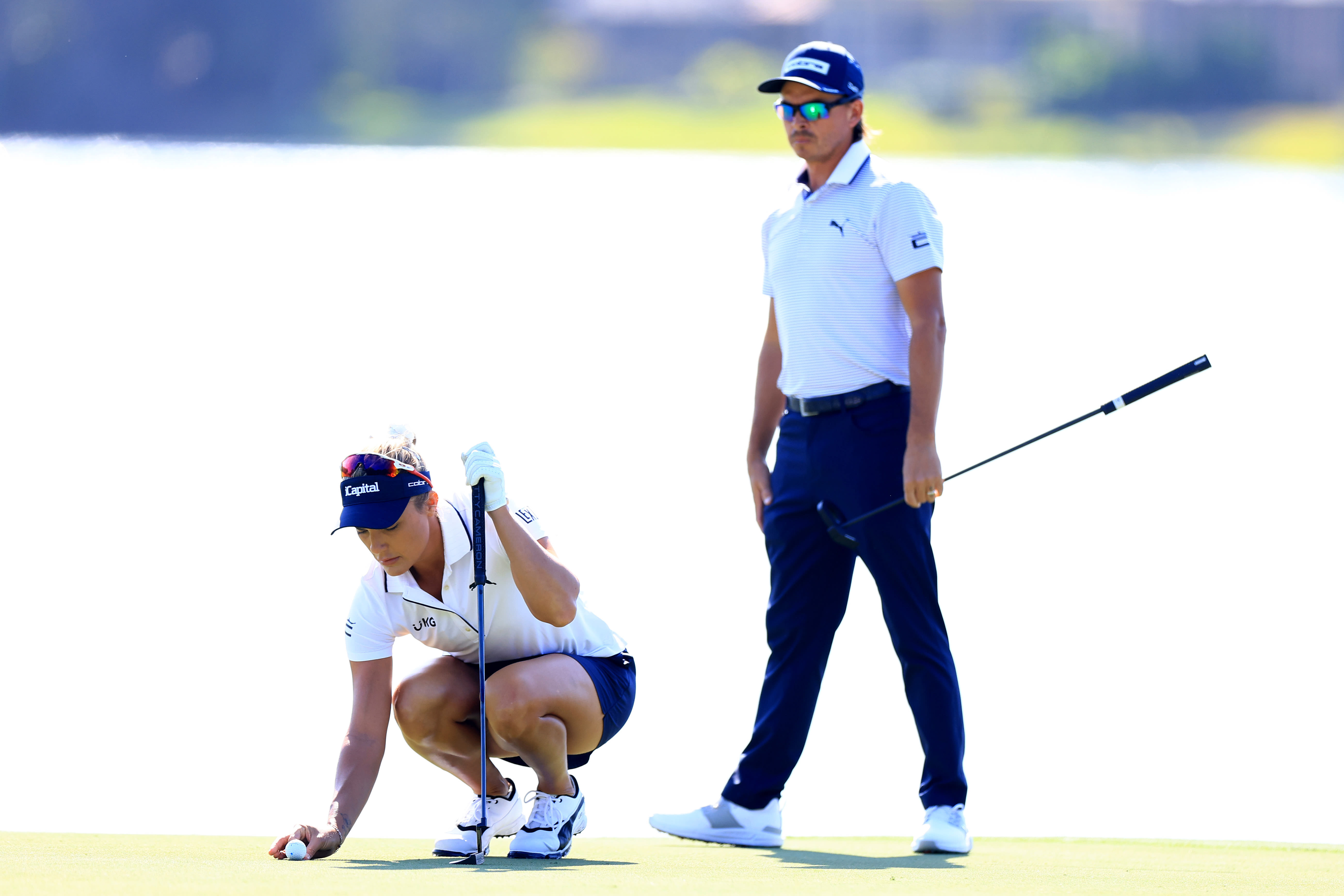 Lexi Thompson and Rickie Fowler.