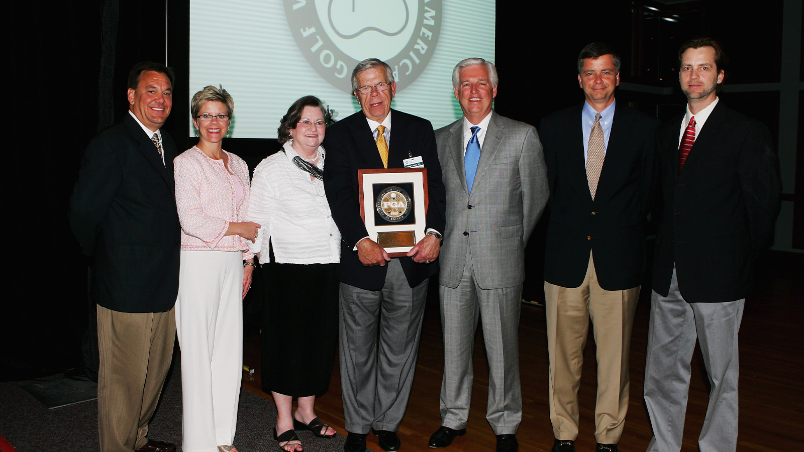 Ron Green Sr. and Roger Warren, Past President of the PGA of America and Green's family after he was presented with the PGA of America Lifetime Achievement Award. (Photo by David Cannon/Getty Images)