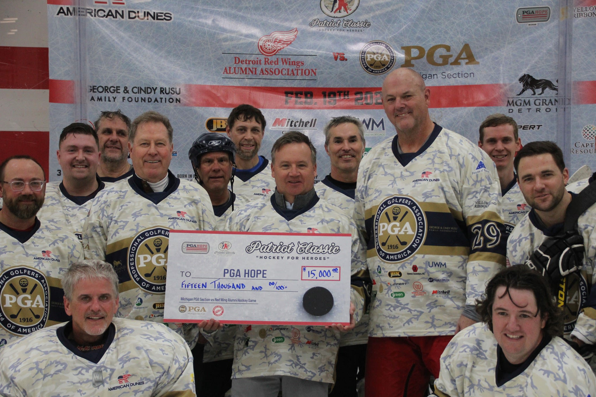 The Michigan PGA team helped raise $15,000 for PGA HOPE programming through the charity hockey game.