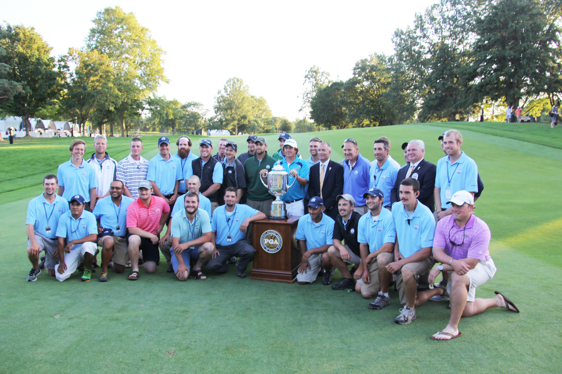 The Oak Hill grounds crew with 2013 PGA Champion Jason Dufner.