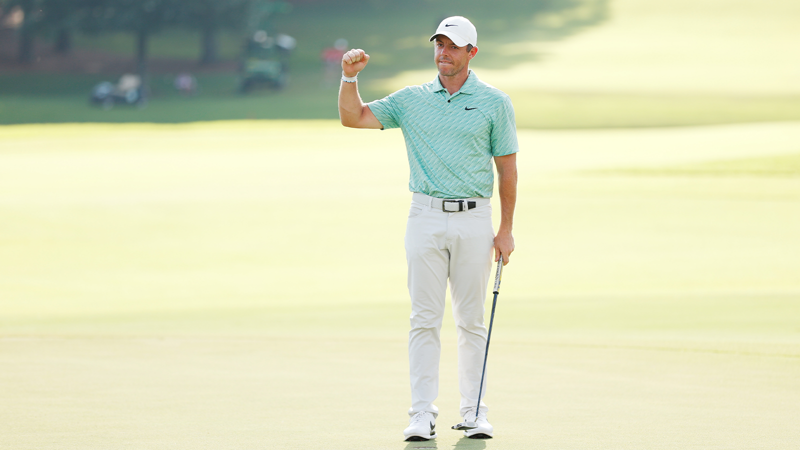 Rory McIlroy of Northern Ireland celebrates on the 18th green after winning during the final round of the TOUR Championship at East Lake Golf Club on August 28, 2022 in Atlanta, Georgia. (Photo by Cliff Hawkins/Getty Images)
