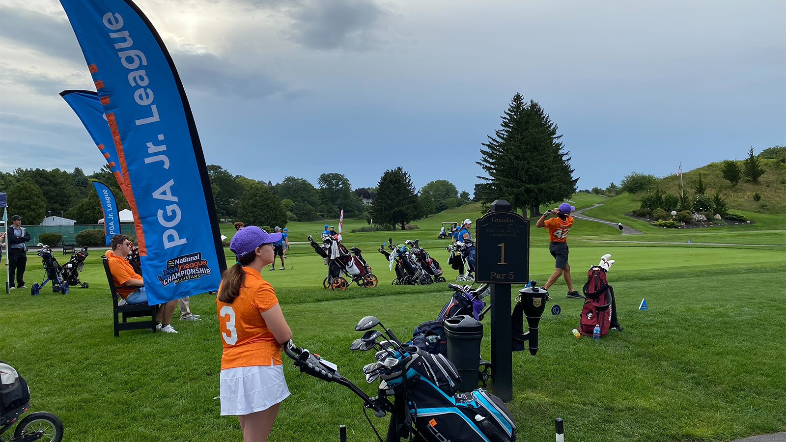 Players teeing off at the Region 2 National Car Rental PGA Jr. League Regional Championship at Drumlins Country Club in Syracuse, NY. 