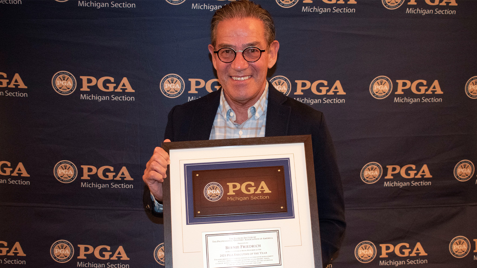 Bernie Friedrich, PGA, receives the inaugural Michigan Section PGA Golf Executive of the Year Award in 2021. 