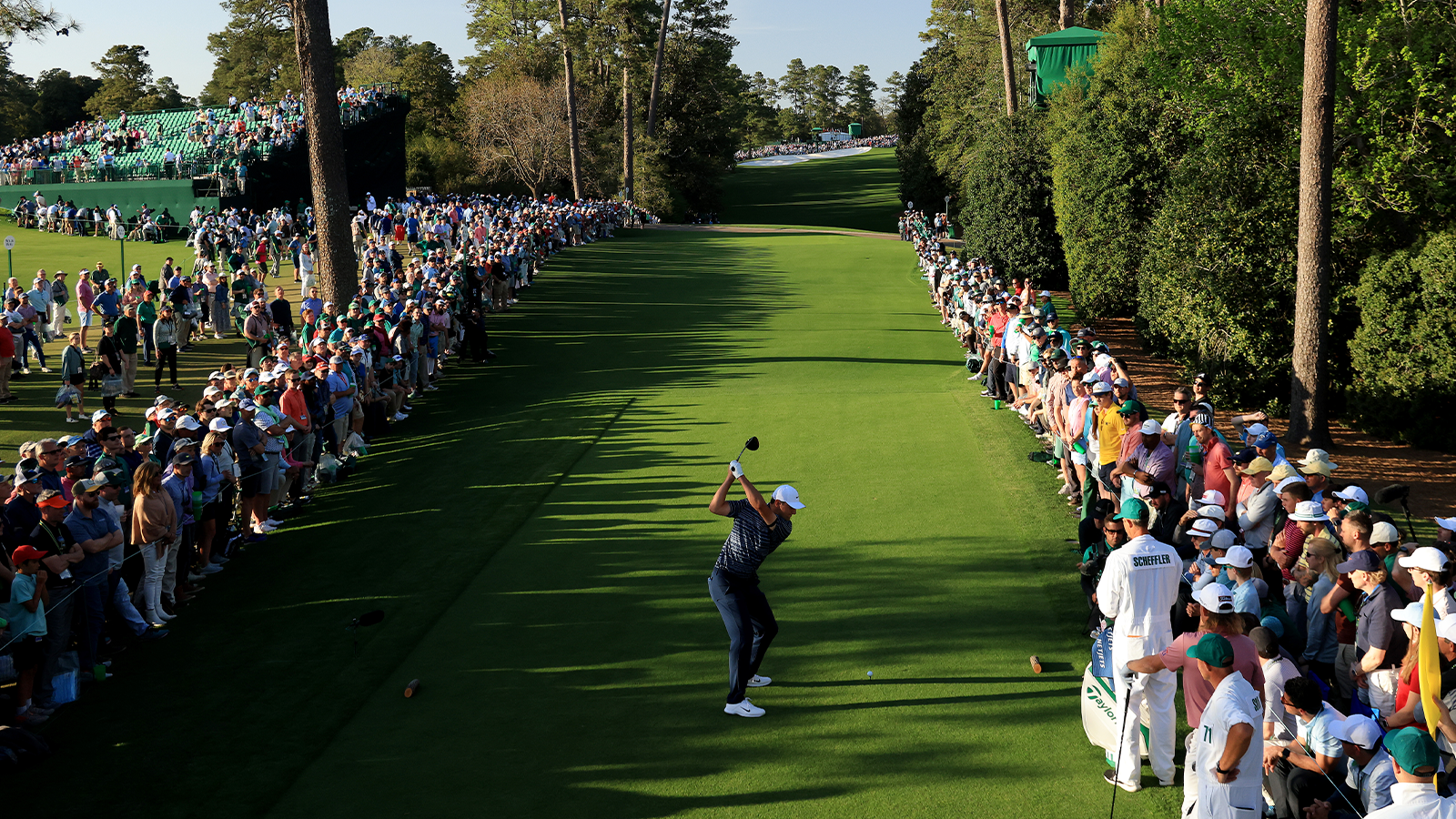 Scottie Scheffler plays his shot from the 18th tee during the final round of the Masters at Augusta National Golf Club.