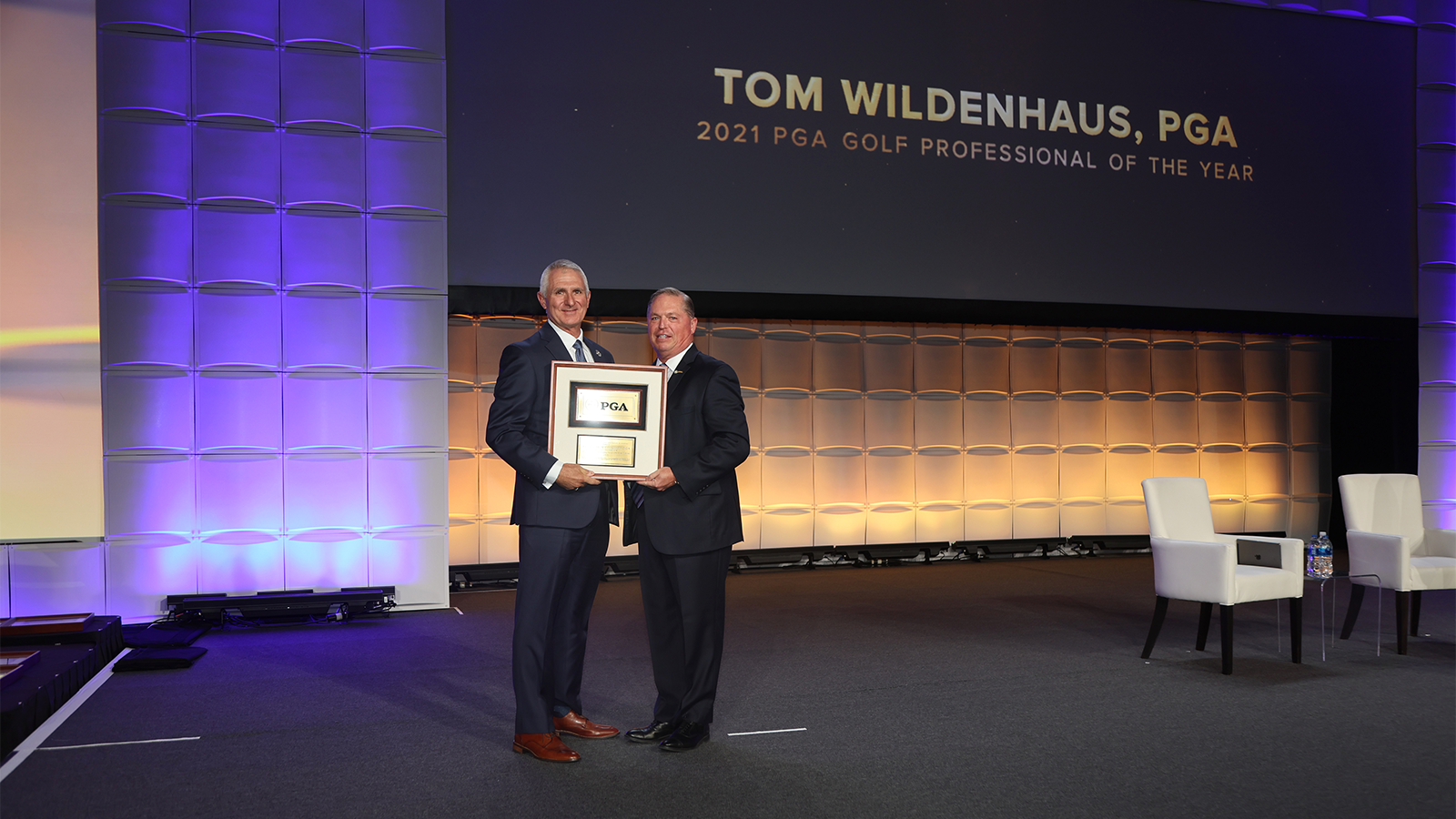 PGA of America President Jim Richerson poses for a photo with the winner of the PGA Professional of the Year Award Tom Wildenhaus during the PGA Special Awards night for the 106th PGA Annual Meeting at JW Marriott Phoenix Desert Ridge Resort & Spa on Tuesday, November 1, 2022 in Phoenix, Arizona. (Photo by Sam Greenwood/PGA of America)