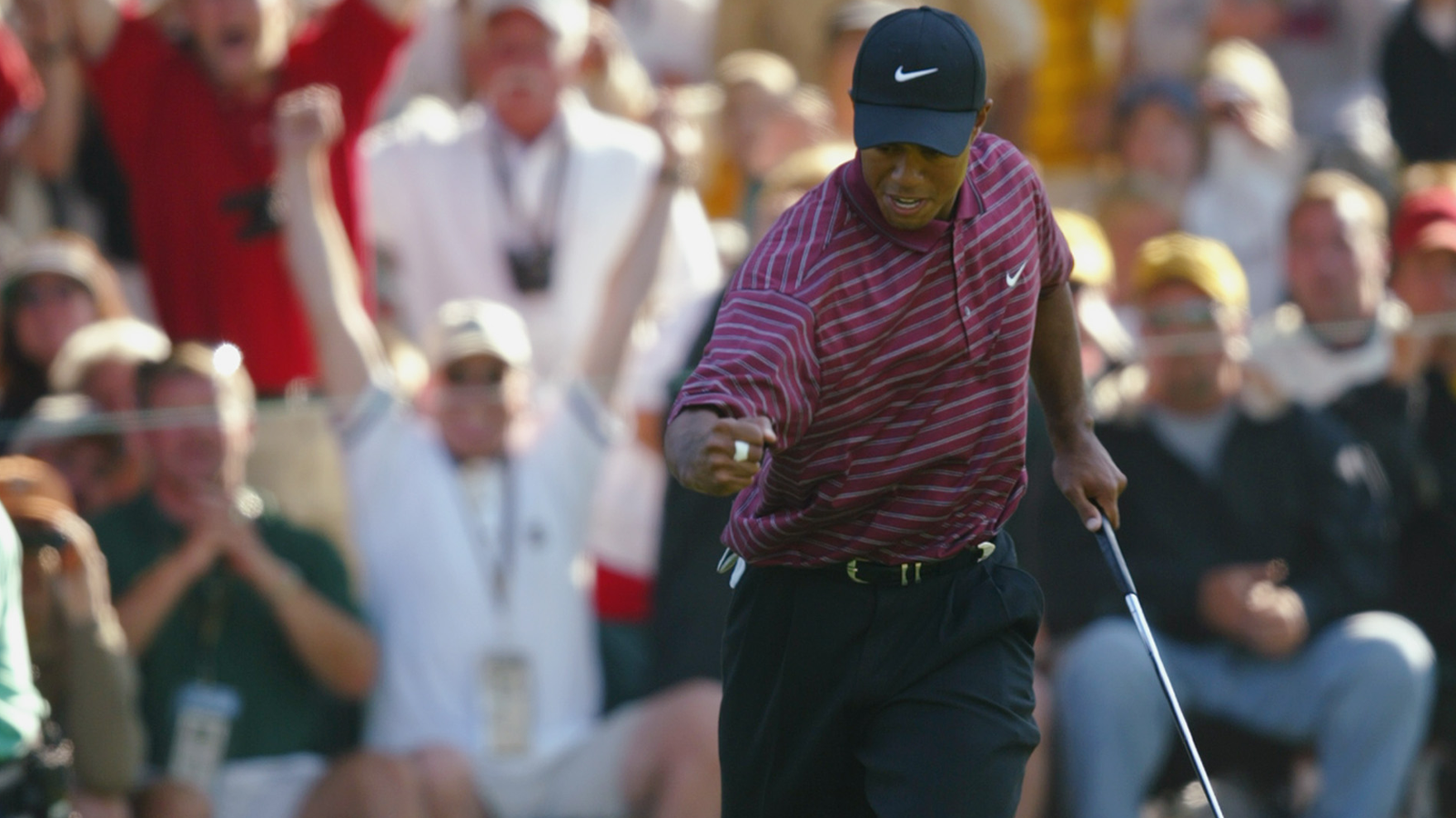 Tiger Woods celebrates a birdie during the final round on August 18, 2002 for the PGA Championship at Hazeltine National Golf Club.