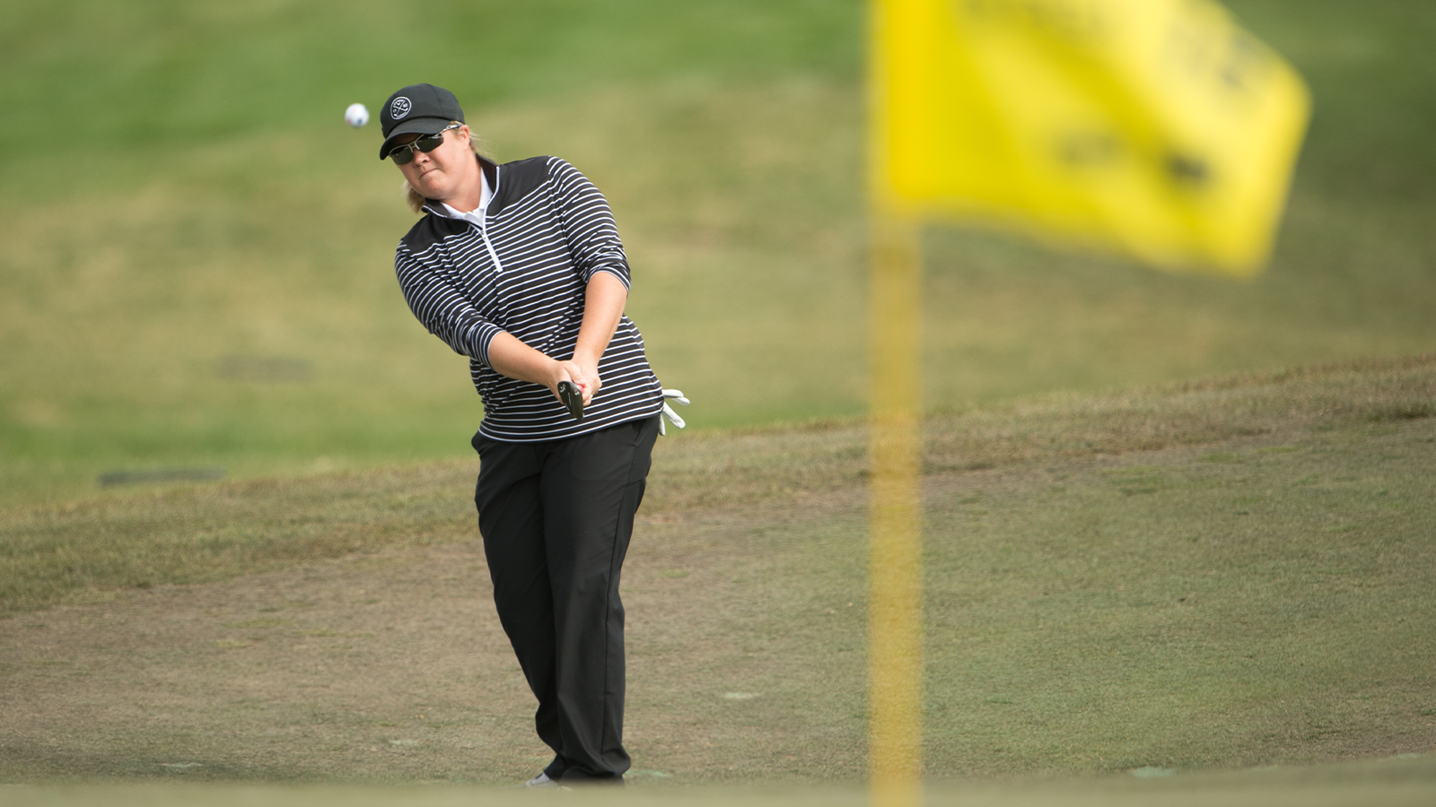 Brittany Kelly chips onto the green on the sixteenth hole during the first round of the 51st PGA Professional Championship held at Bayonet Black Horse on June 17, 2018 in Seaside, California. (Photo by Montana Pritchard/PGA of America)