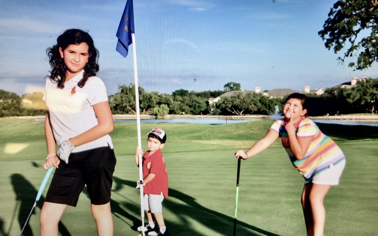 Davila (far right) and her siblings were exposed to golf early on at her father's driving range in San Antonio.