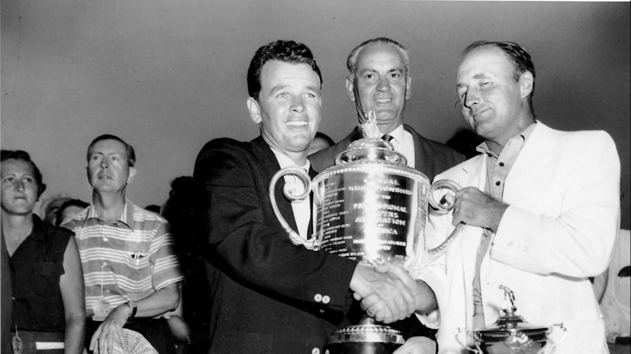 Burke Jr. receives the Wanamaker Trophy after winning the 1956 PGA Championship.