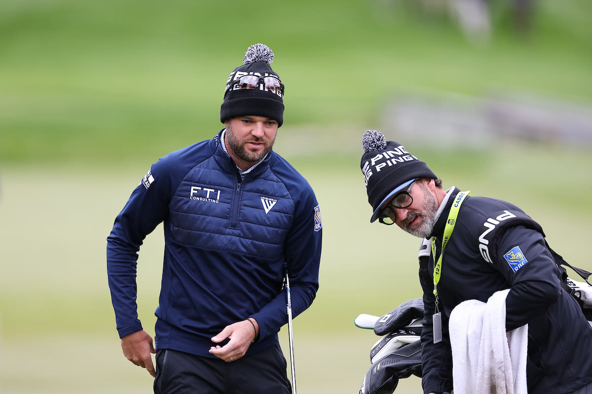 Corey Conners and his caddie on the second hole during the PGA Championship at Oak Hill Country Club on Wednesday, May 17, 2023 in Rochester, New York. (Photo by Scott Taetsch/PGA of America)