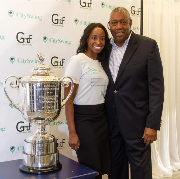 Tari Cash and her father with the Wanamaker Trophy.