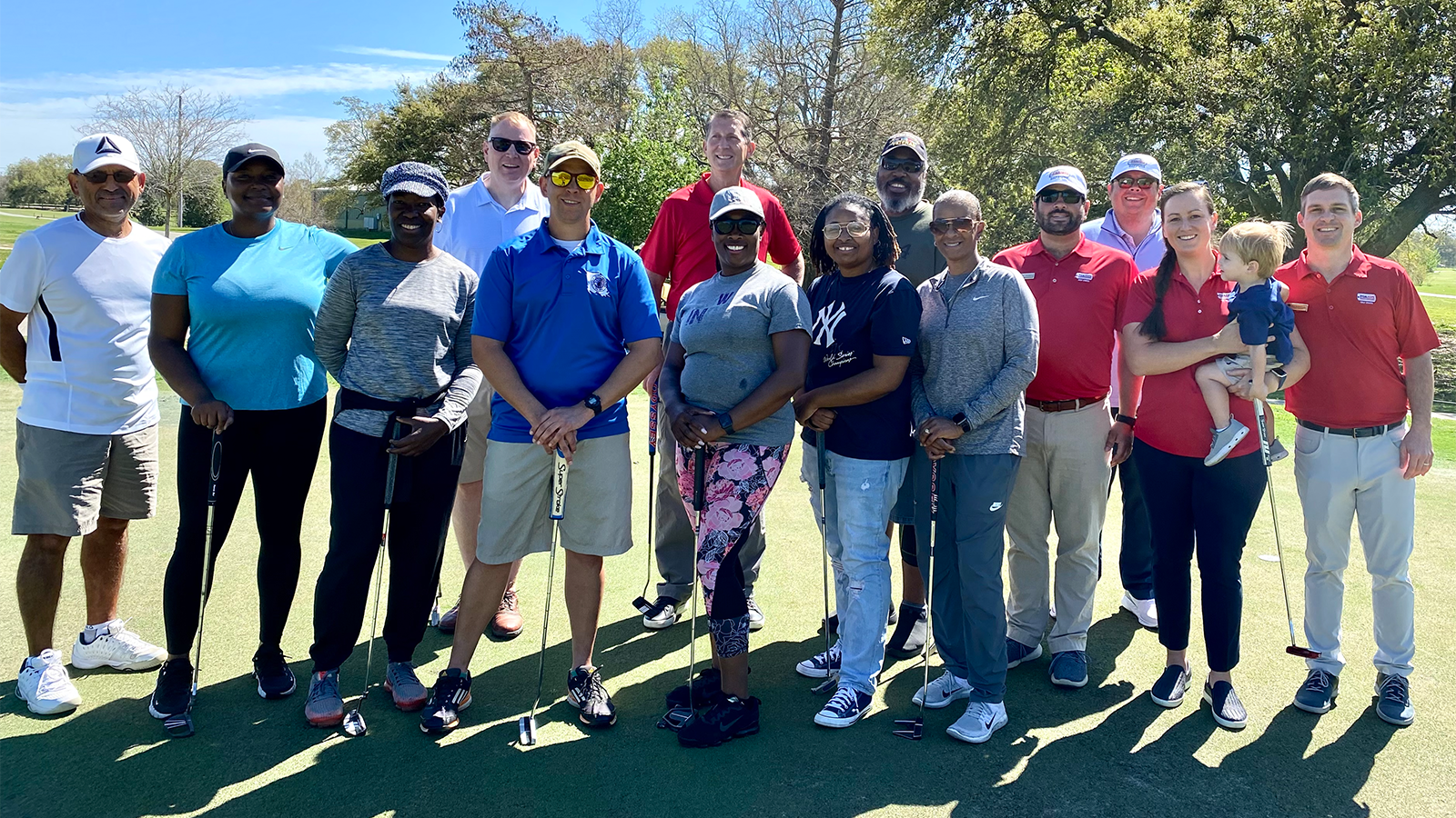 PGA Professionals Matt and Morgan Williamson with PGA HOPE golfers.  