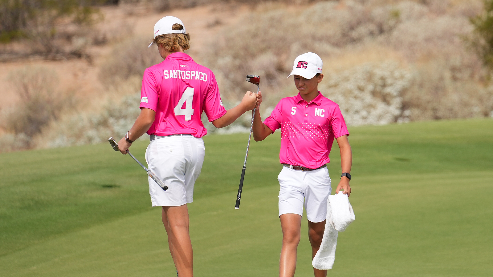 John John Santospago of Team North Carolina celebrates with teammate Miles Russell of Team North Carolina during the second round of the 2022 National Car Rental PGA Jr. League Championship at Grayhawk Golf Club on October 8, 2022 in Scottsdale, Arizona. (Photo by Darren Carroll/PGA of America)