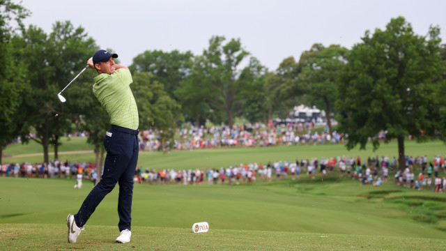 Rory McIlroy of Northern Ireland hits his shot from the 11th tee during the first round of the 2022 PGA Championship at the Southern Hills on May 19, 2022 in Tulsa, Oklahoma. (Photo by Maddie Meyer/PGA of America)