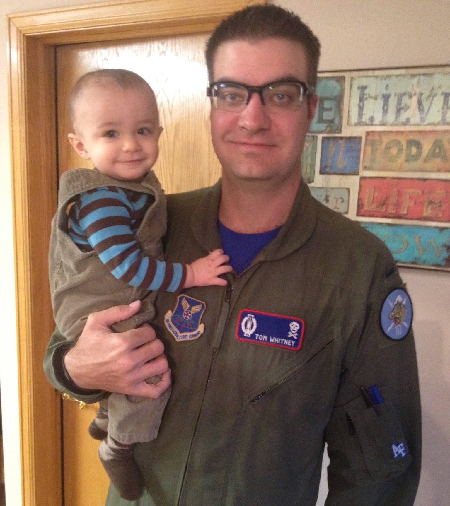 Whitney, with one of his sons, had his last day in the Air Force in 2014 before moving to professional golf.