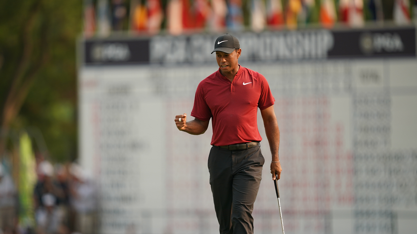  Tiger Woods reacts to making his putt for birdie on the 18th hole during the final round of the 100th PGA Championship held at Bellerive Golf Club on August 12, 2018 in St. Louis, Missouri. (Photo by Montana Pritchard/PGA of America)