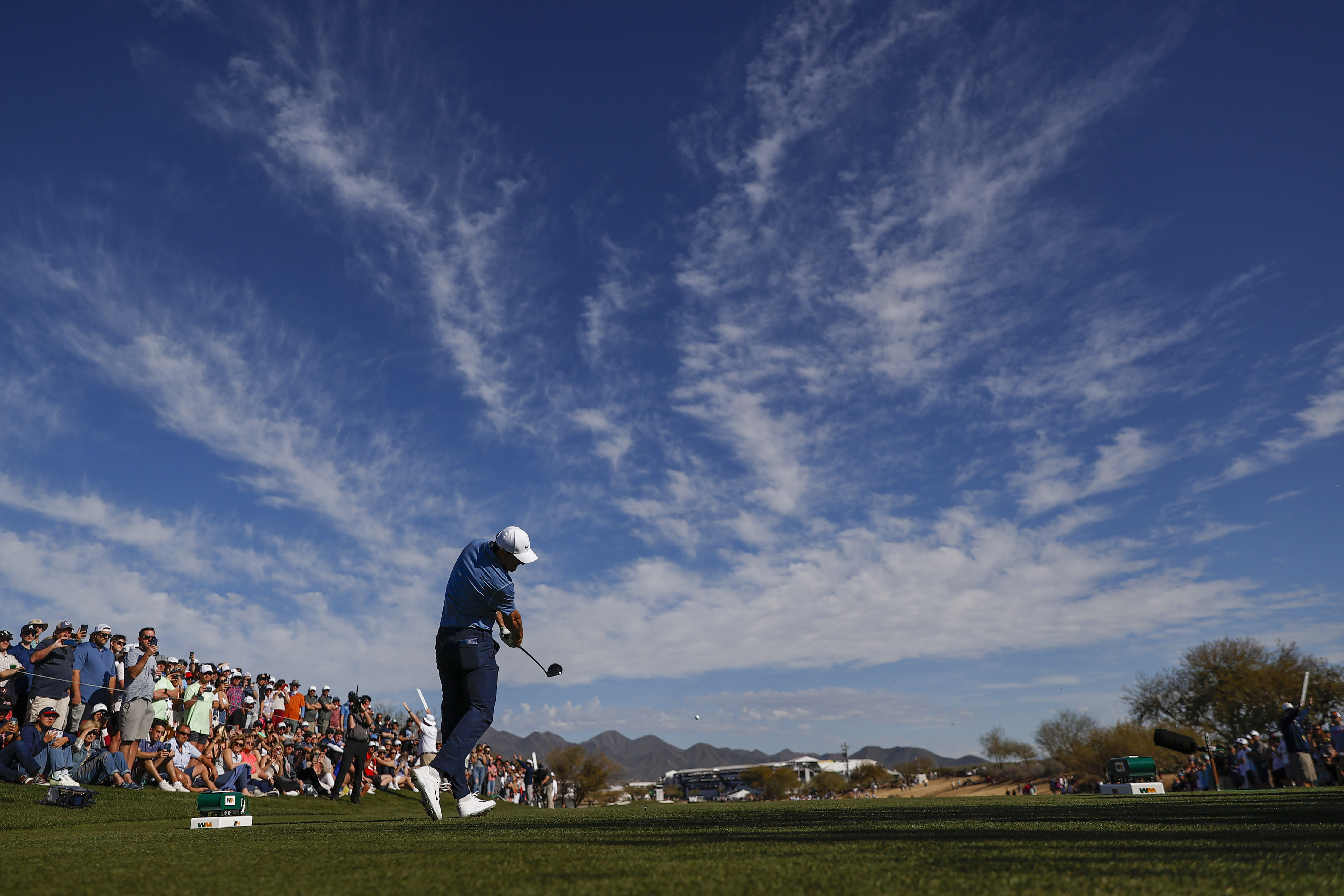 Scottie Scheffler plays his shot from the 15th tee during the final round of the 2023 WM Phoenix Open at TPC Scottsdale. (Photo by Steph Chambers/Getty Images)
