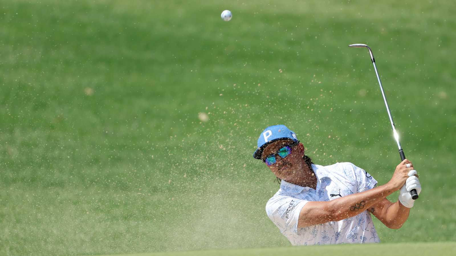 Rickie Fowler of the United States plays a shot from a bunker on the eighth hole during the first round of the 2022 PGA Championship. (Photo by Christian Petersen/Getty Images)