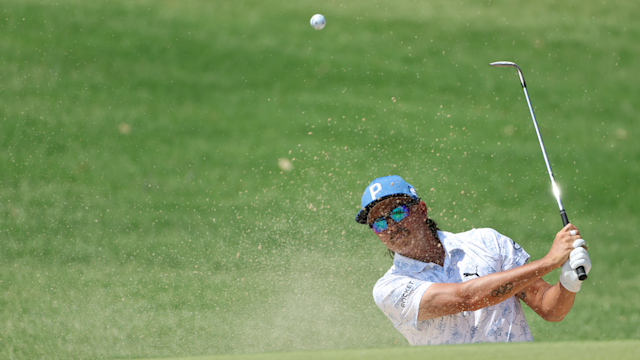 Rickie Fowler of the United States plays a shot from a bunker on the eighth hole during the first round of the 2022 PGA Championship. (Photo by Christian Petersen/Getty Images)